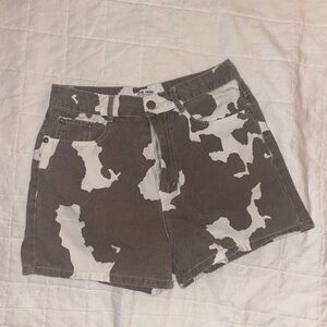Cow print jean shorts